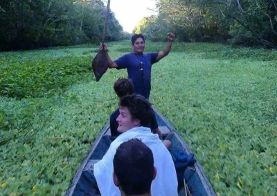 River ride with aquatic plants in the Amazon